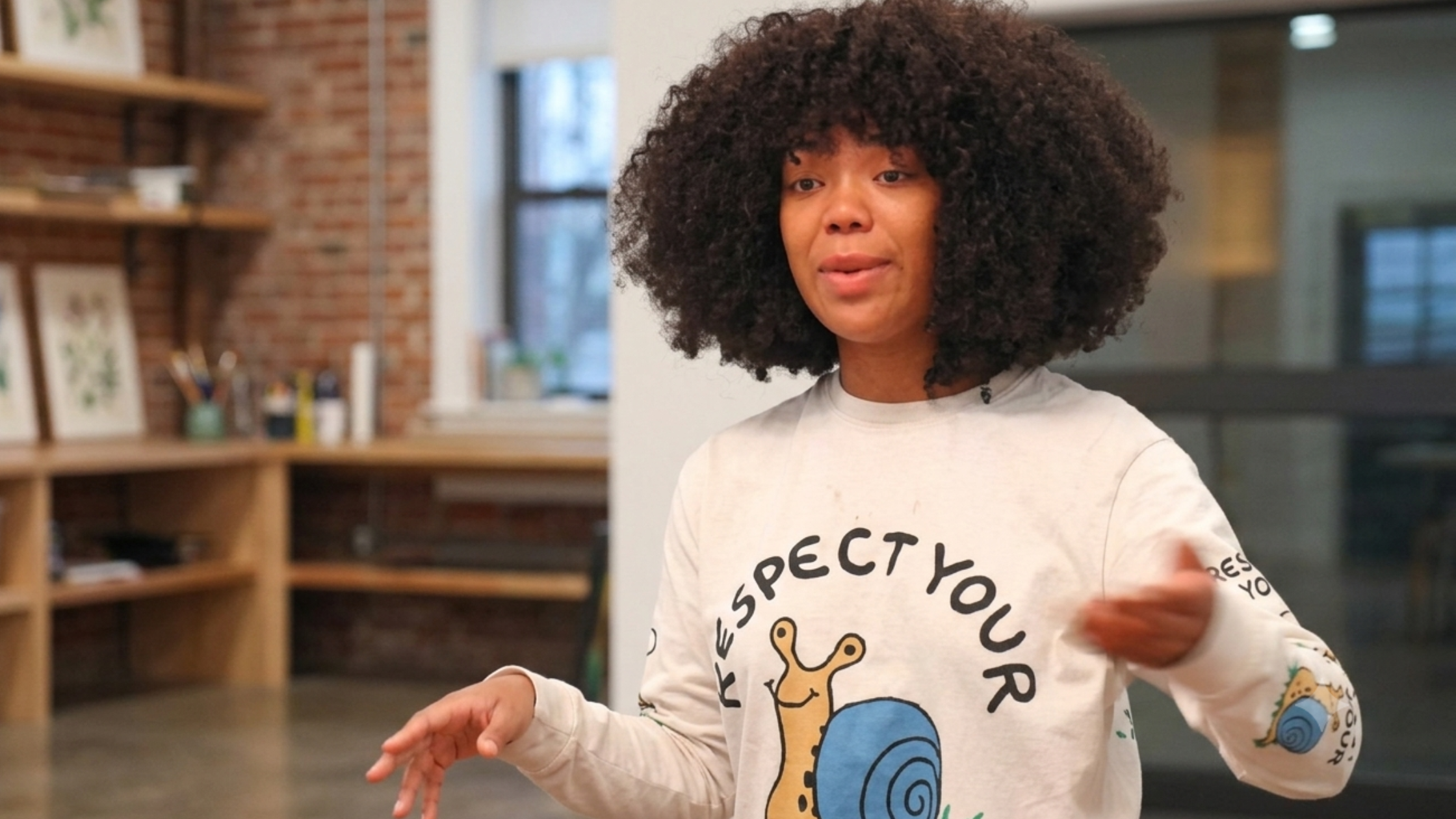 Next Gen NYC S02 Riley Burruss Respect Mental Health Cream Long Sleeve T-Shirt with snail graphic and floral sleeves
