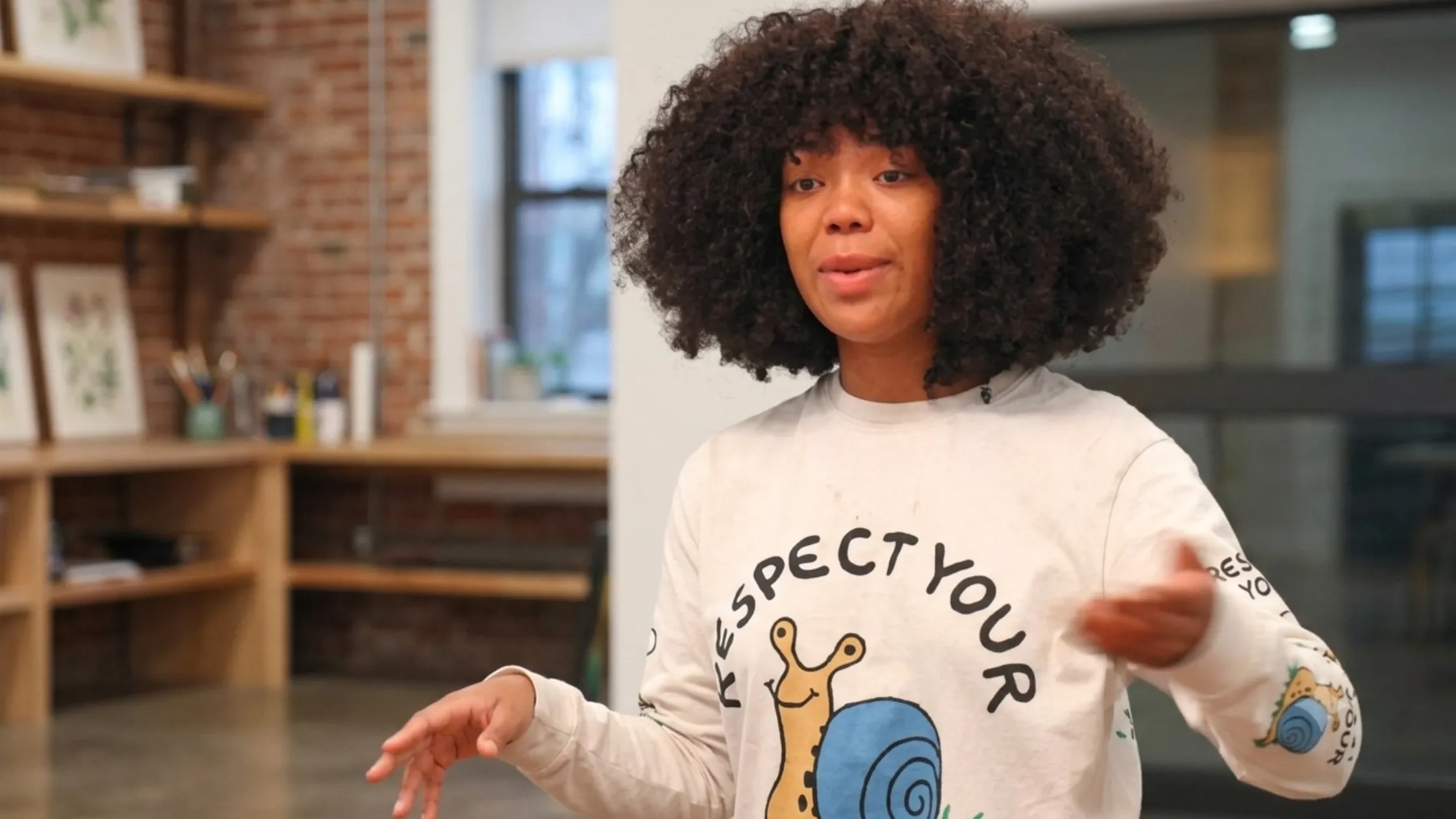 Next Gen NYC S02 Riley Burruss Respect Mental Health Cream Long Sleeve T-Shirt with snail graphic and floral sleeves