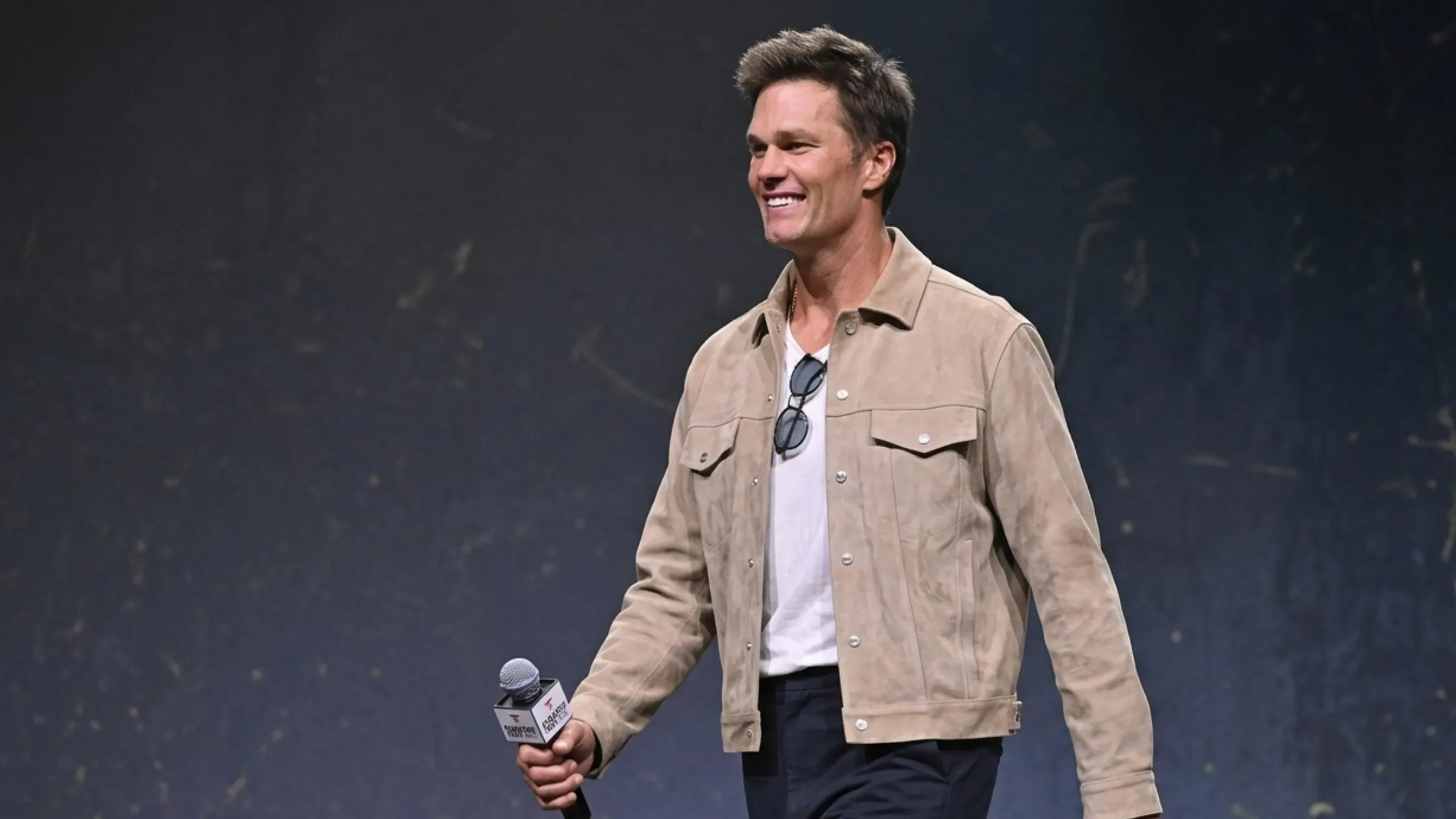 Tom Brady Fanatics Fest NYC 2026 light beige suede trucker jacket with snap button front and chest flap pockets