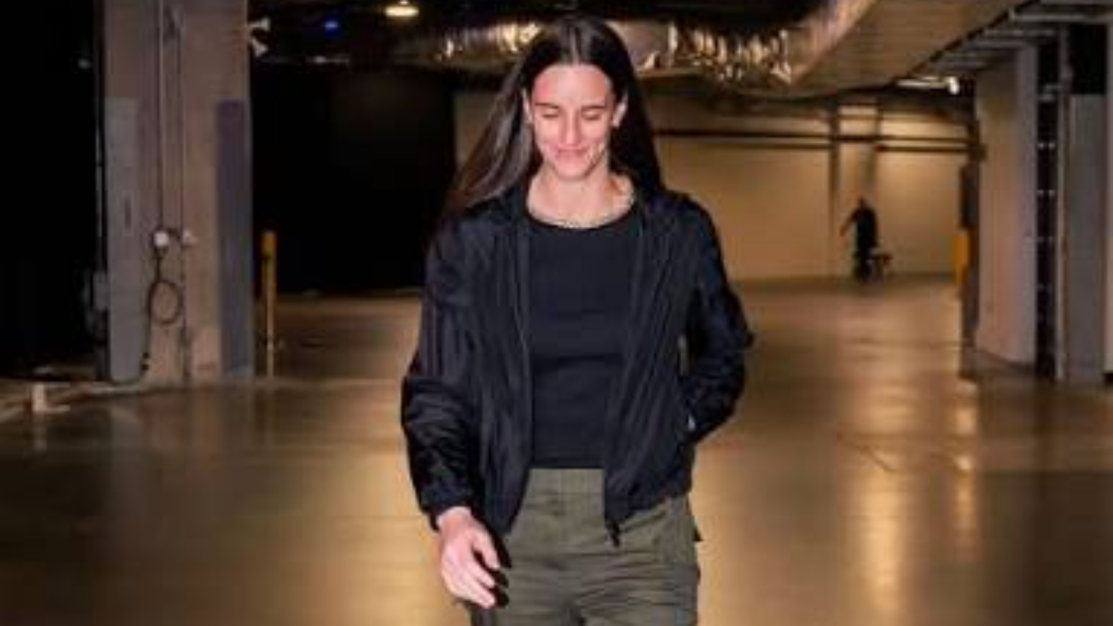 How to Get Caitlin Clark’s Sleek Black Jacket Look