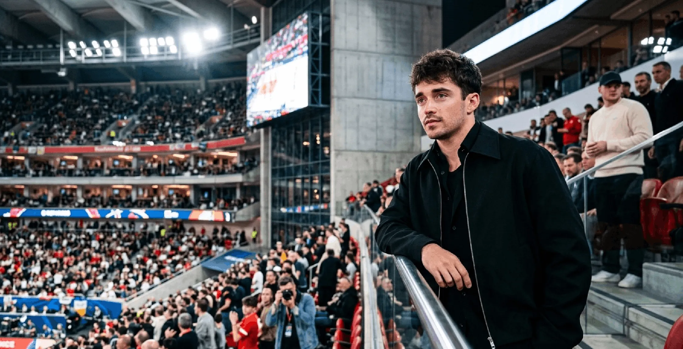 Charles Leclerc Euroleague minimalist black Harrington jacket with cropped boxy fit and silver zipper design courtside fashion