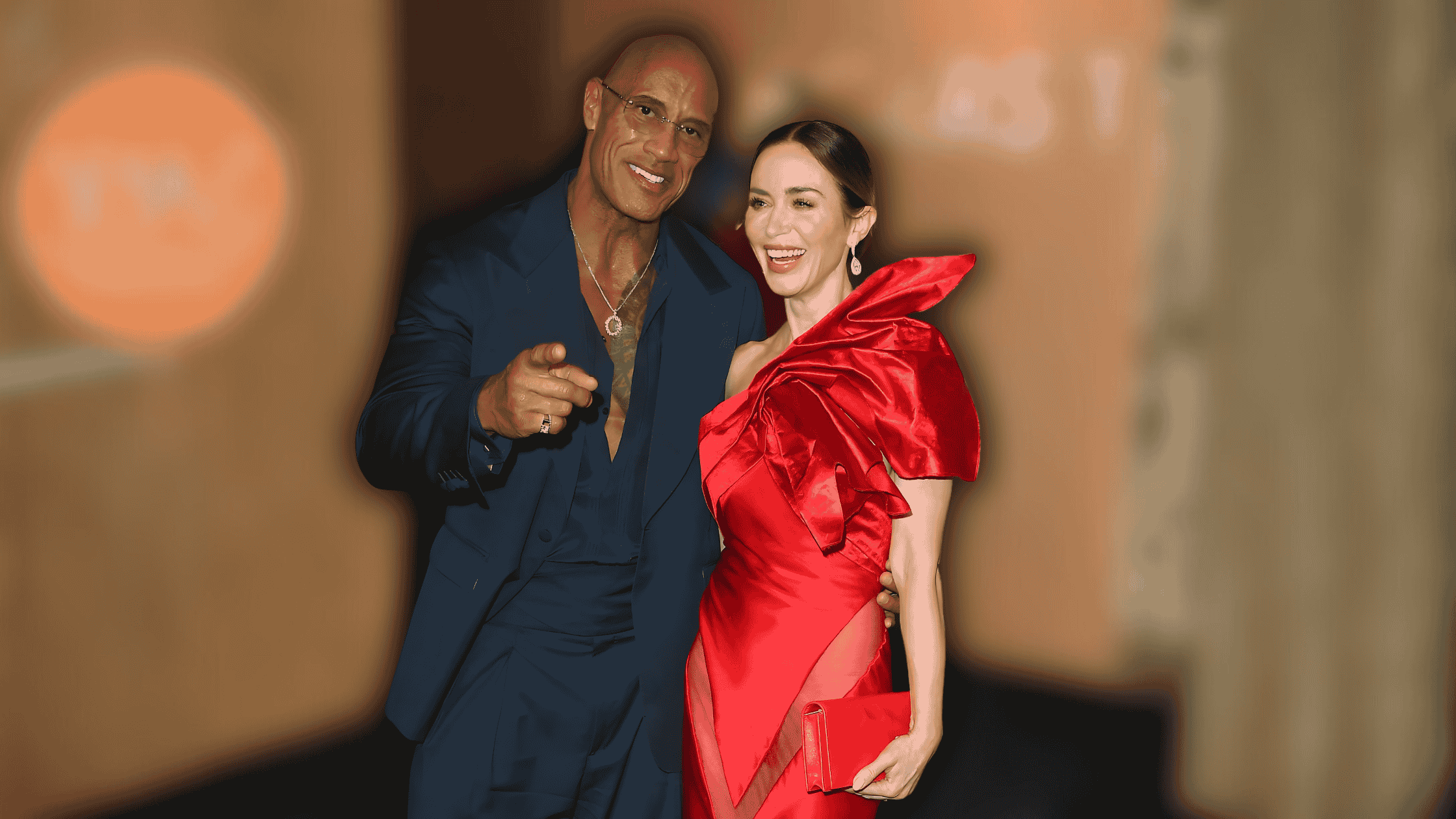 Dwayne Johnson and Emily Blunt at the 16th Governors Awards Dark Teal Suit &amp; Red Sculptural Satin Gown