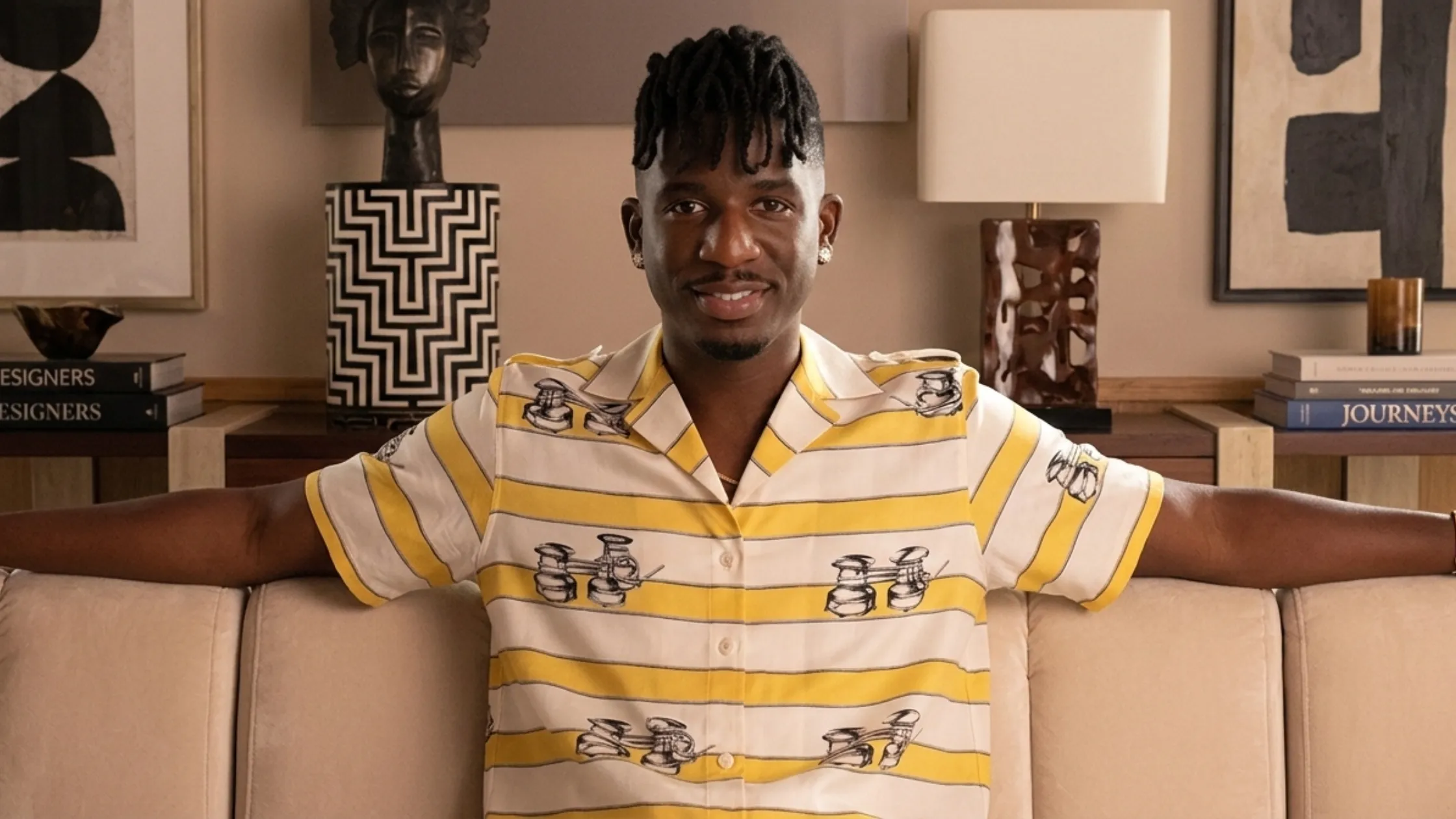 Samuel Arnold wearing yellow striped Margaretha Ley shirt with nautical print on Emily in Paris S05 episode
