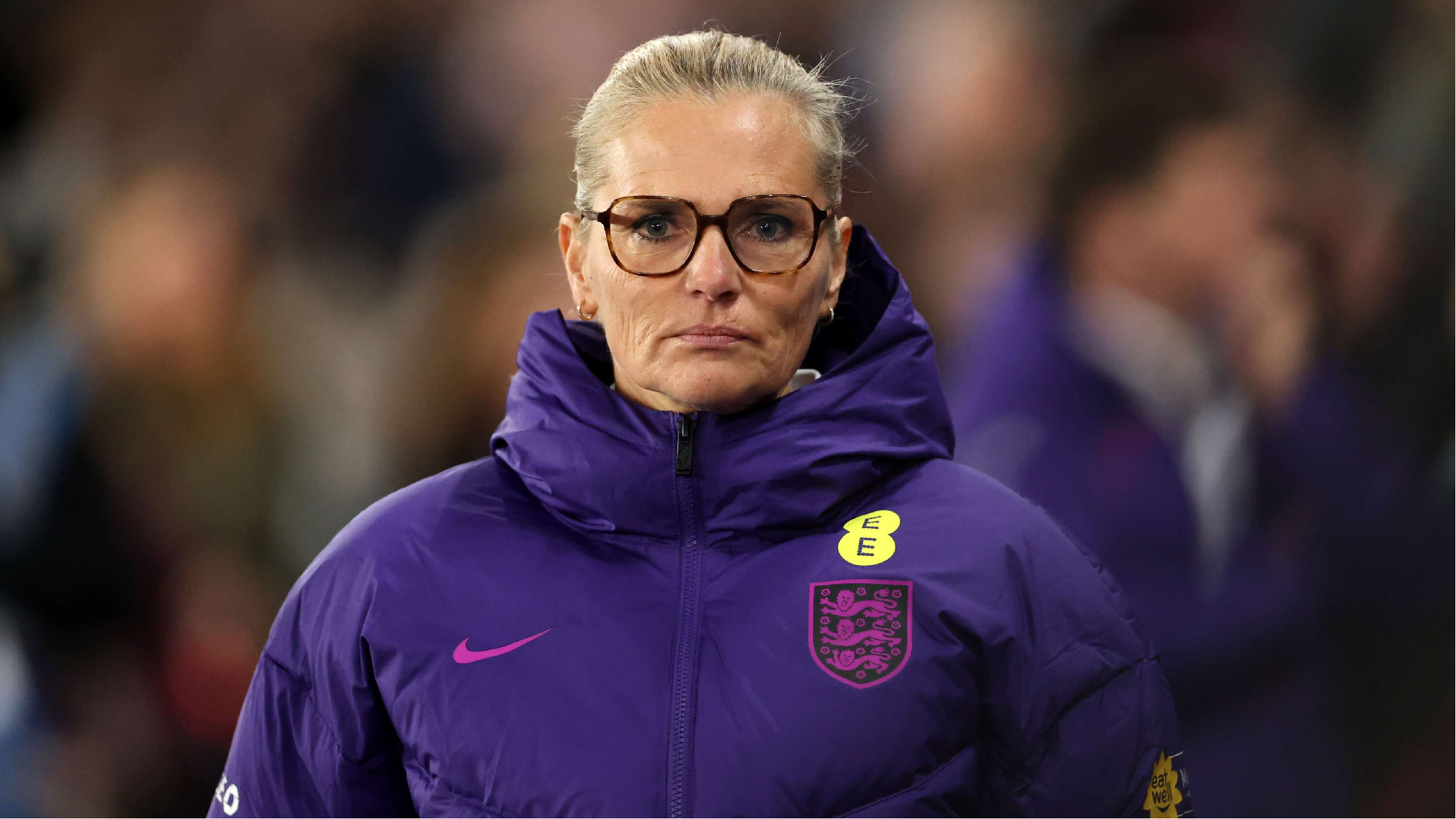 Sarina Wiegman, England Lionesses head coach, wearing Nike purple hooded puffer jacket during FIFA Women’s World Cup qualifier against Iceland in Nottingham, March 2026.