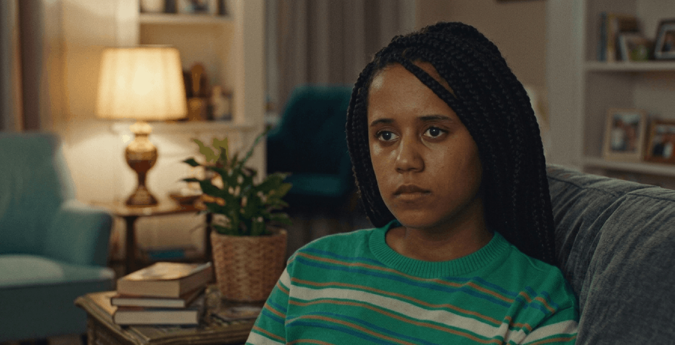 Eden Hollingsworth green striped sweater inspired by I Jack Wright featuring multicolor horizontal stripes and crewneck design