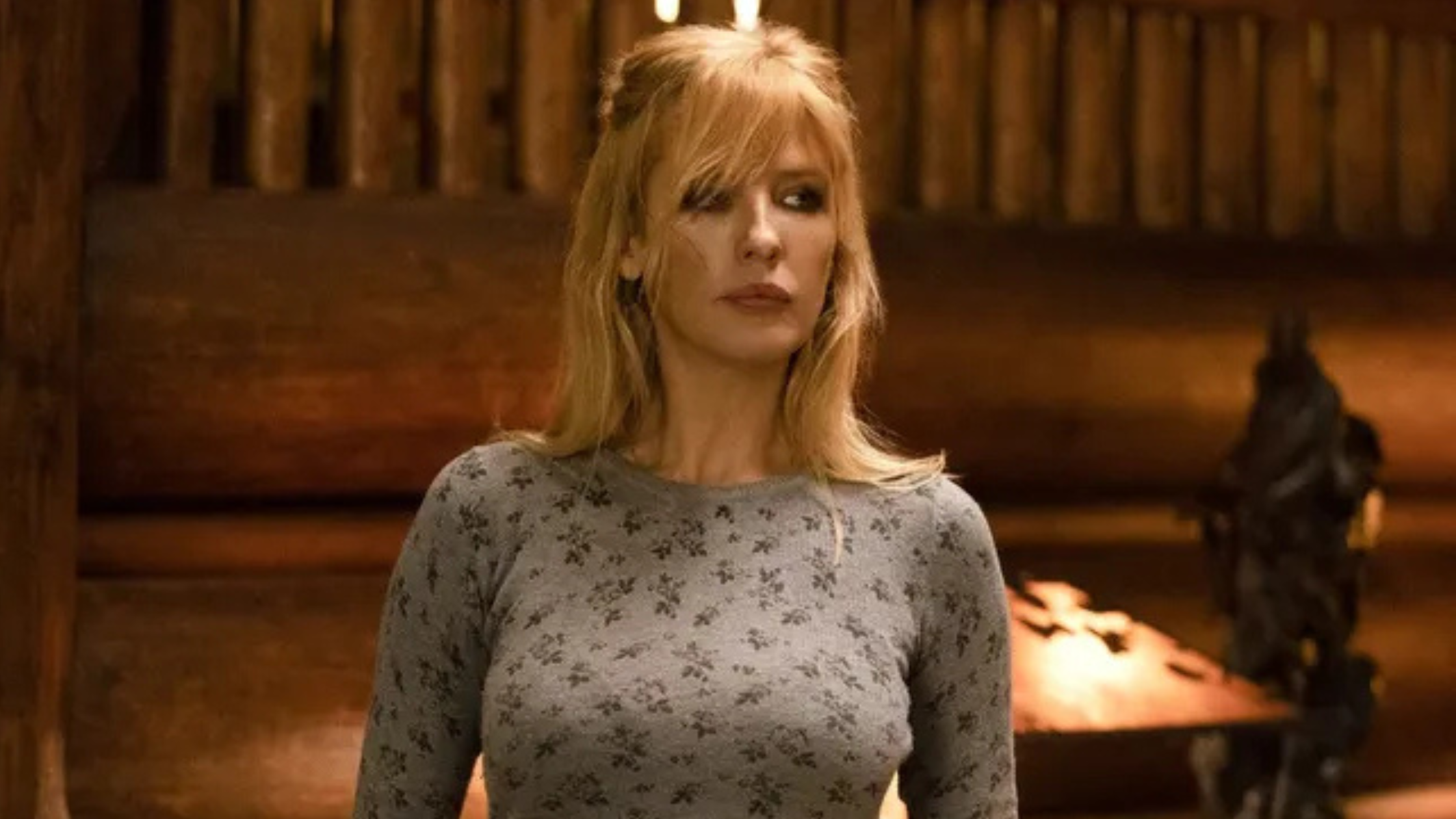 Kelly Reilly stylishly wears iconic coats from Under Salt Marsh and Yellowstone, showcasing bold, character-driven TV fashion