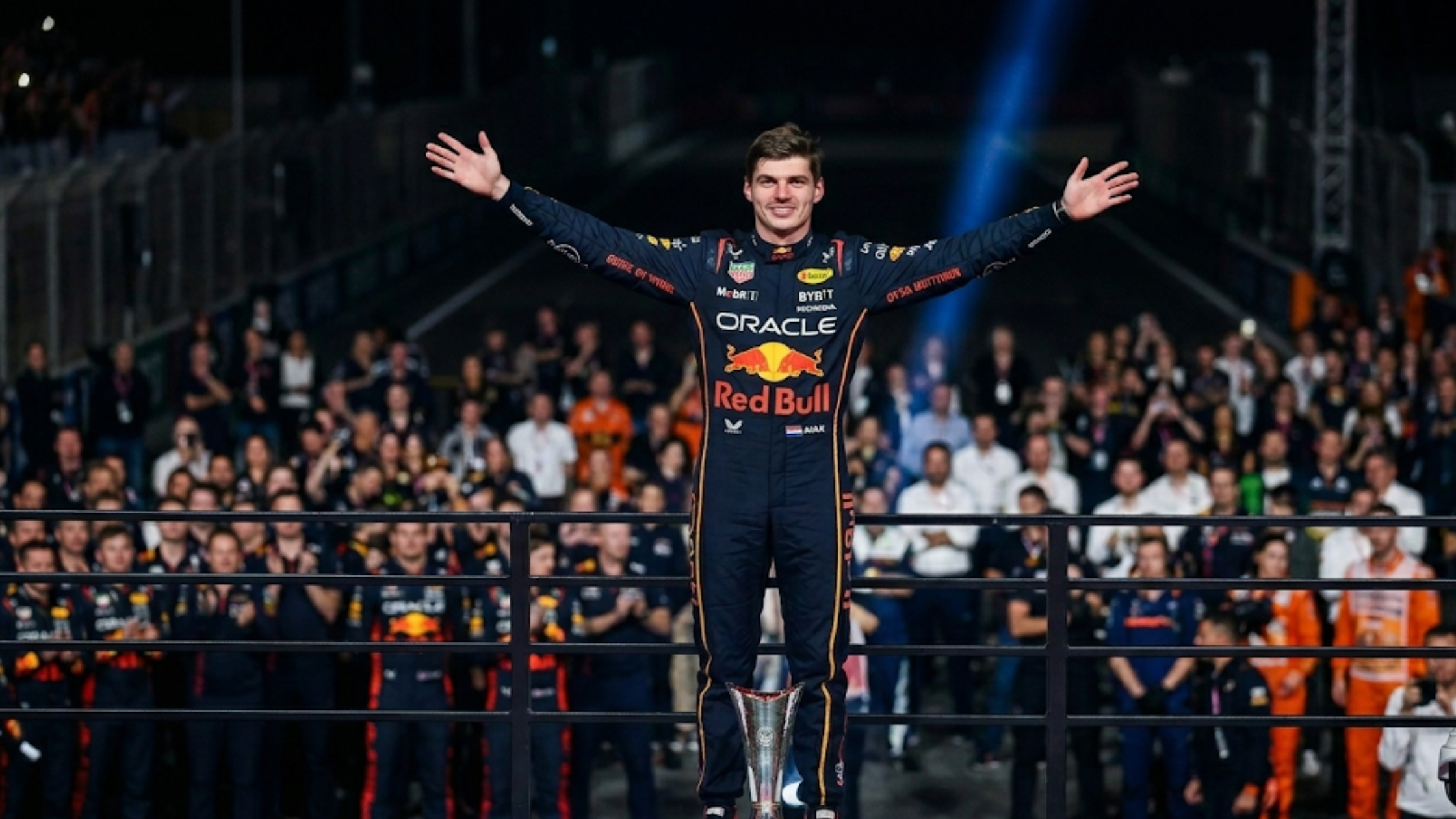 Max Verstappen F1 Las Vegas Grand Prix navy blue racing jumpsuit with yellow piping and Oracle Red Bull Racing sponsor logos