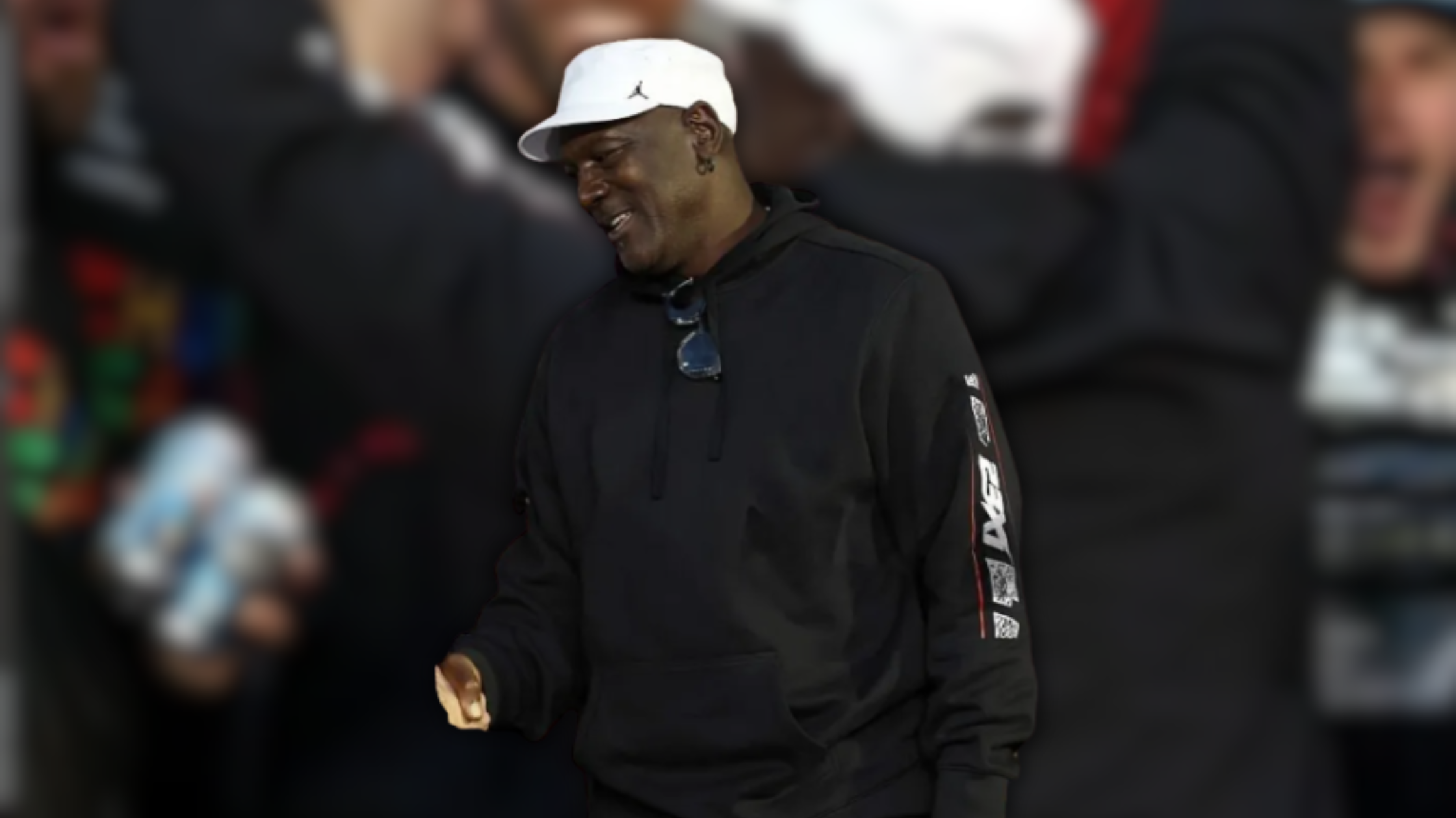 Michael Jordan’s Bold NASCAR Look: Black Hoodie Fashion Statement on the Cup Series Track