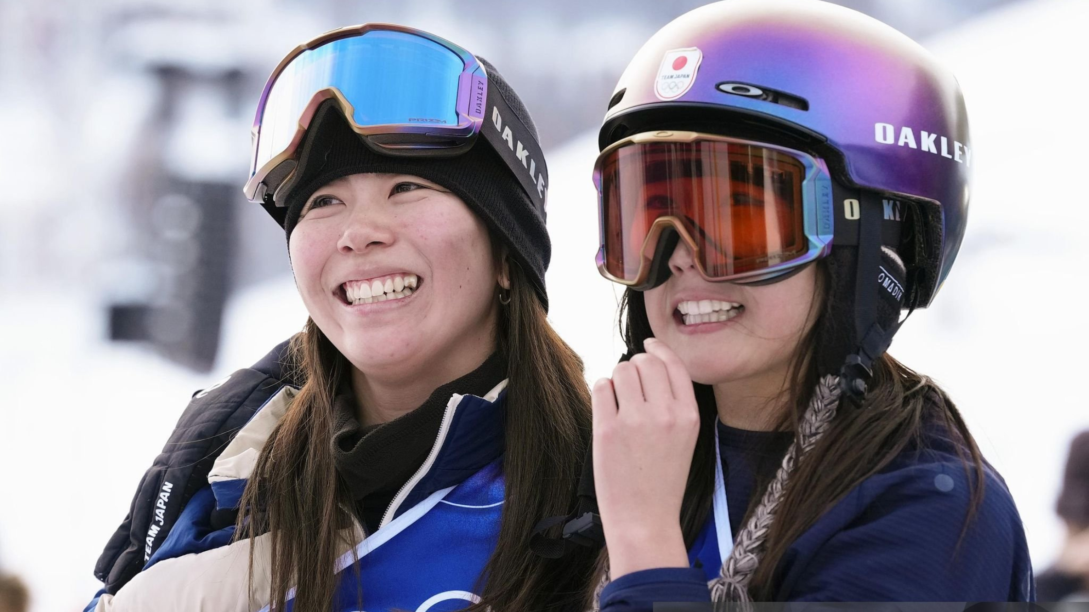 Snowboard Slopestyle stars Mari Fukada and Kokomo Murase celebrate at Milan Cortina Olympics 2026 wearing Team Japan competition outfits.