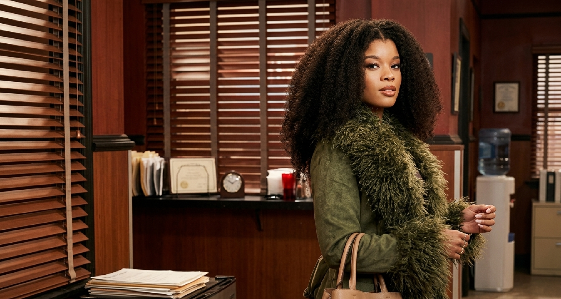 Eva Thomas olive green suede trench coat with faux fur collar, cuffs, and wrap belt from Beyond The Gates 2026