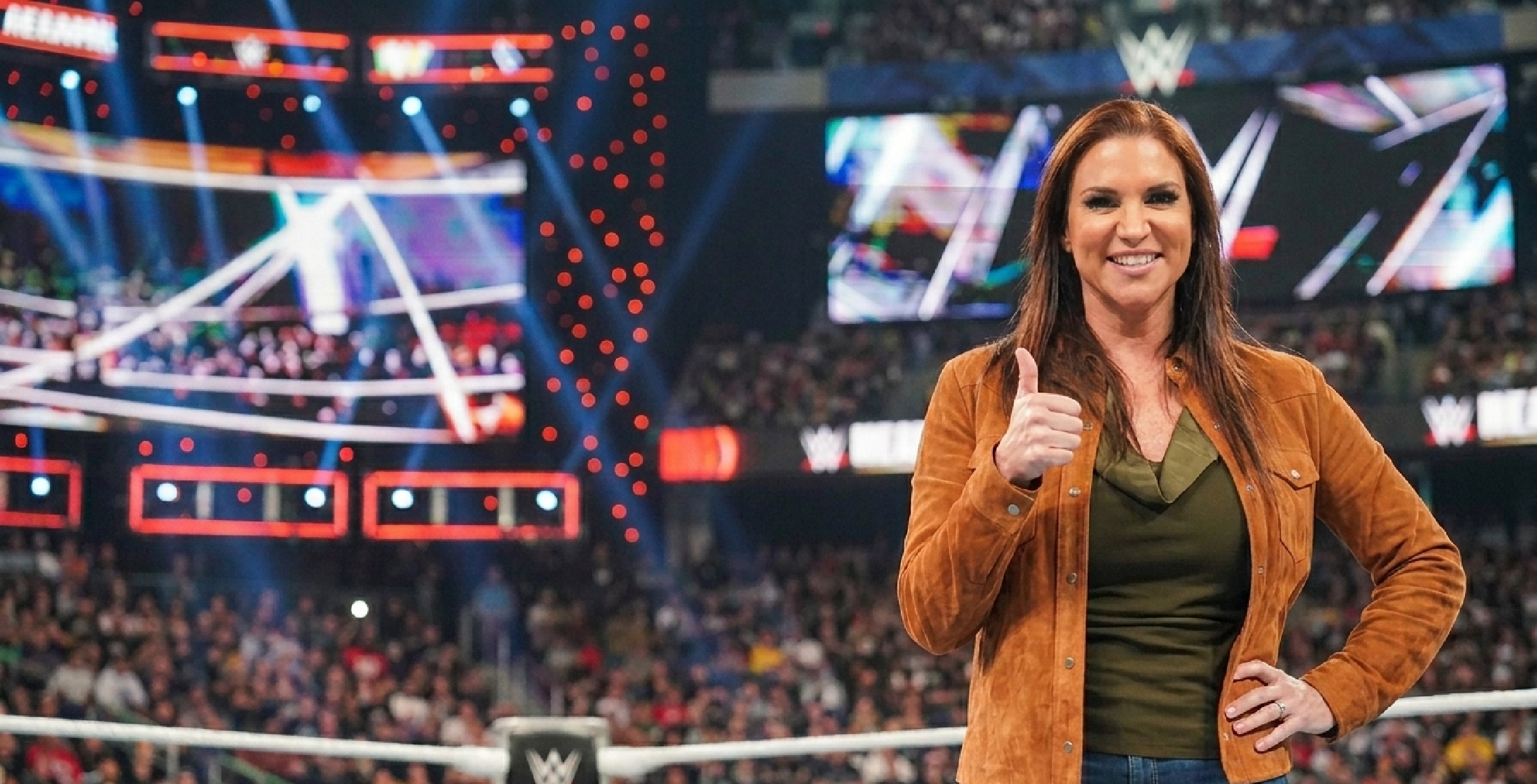 Stephanie McMahon wearing cognac suede hip-length trucker jacket on Monday Night RAW 2026