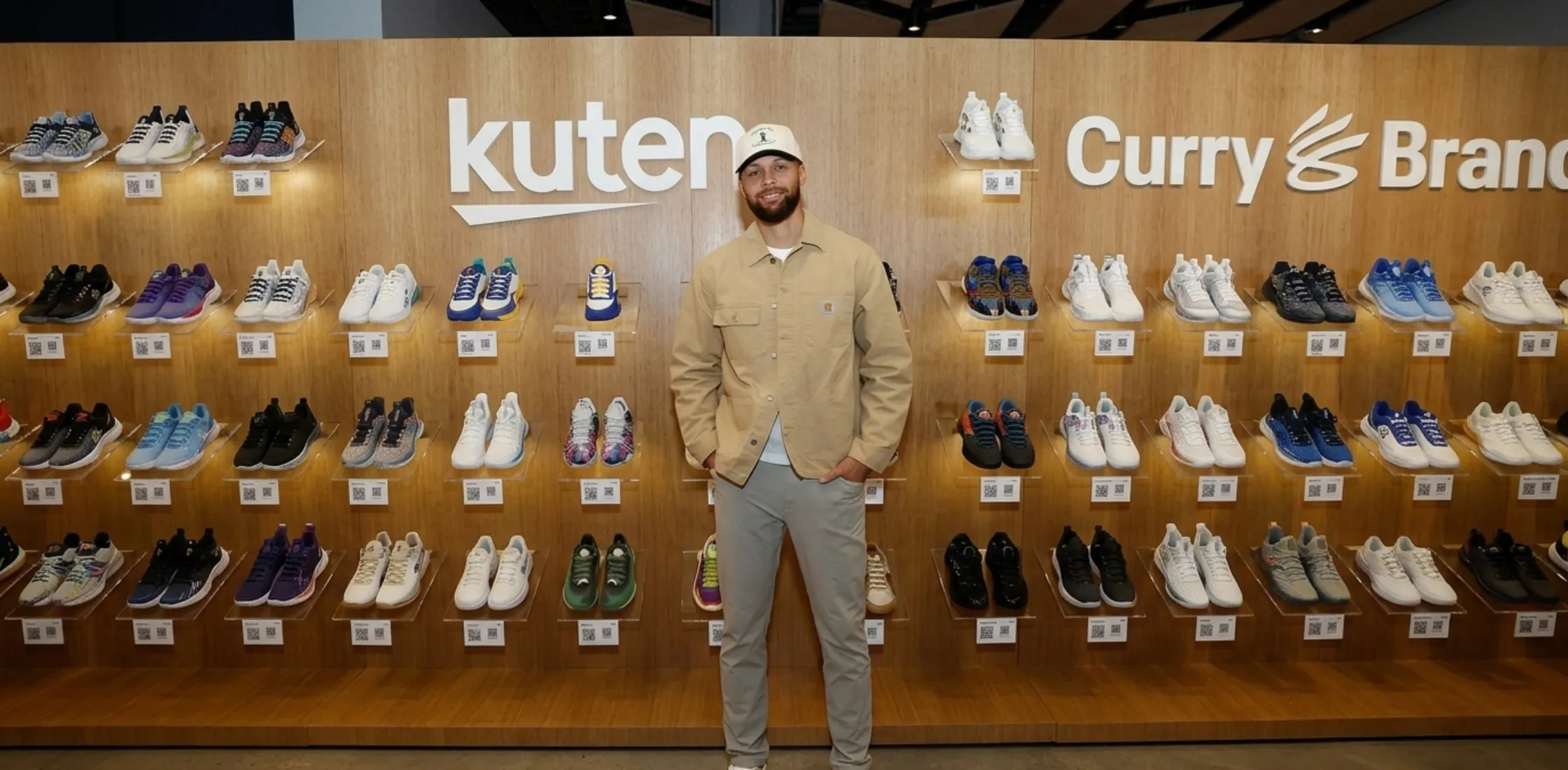Stephen Curry Rakuten x CANVVS beige workwear jacket with chore coat design, multi pockets, and button front, inspired by artistic streetwear style
