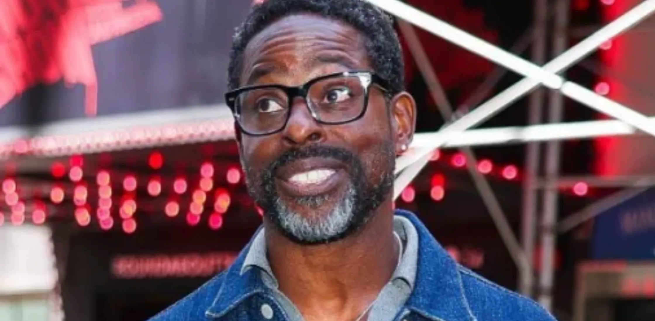 Sterling K. Brown SAG-AFTRA Foundation Conversations indigo sashiko denim trucker jacket with textured weave, structured fit, and silver button closure worn by Sterling K. Brown