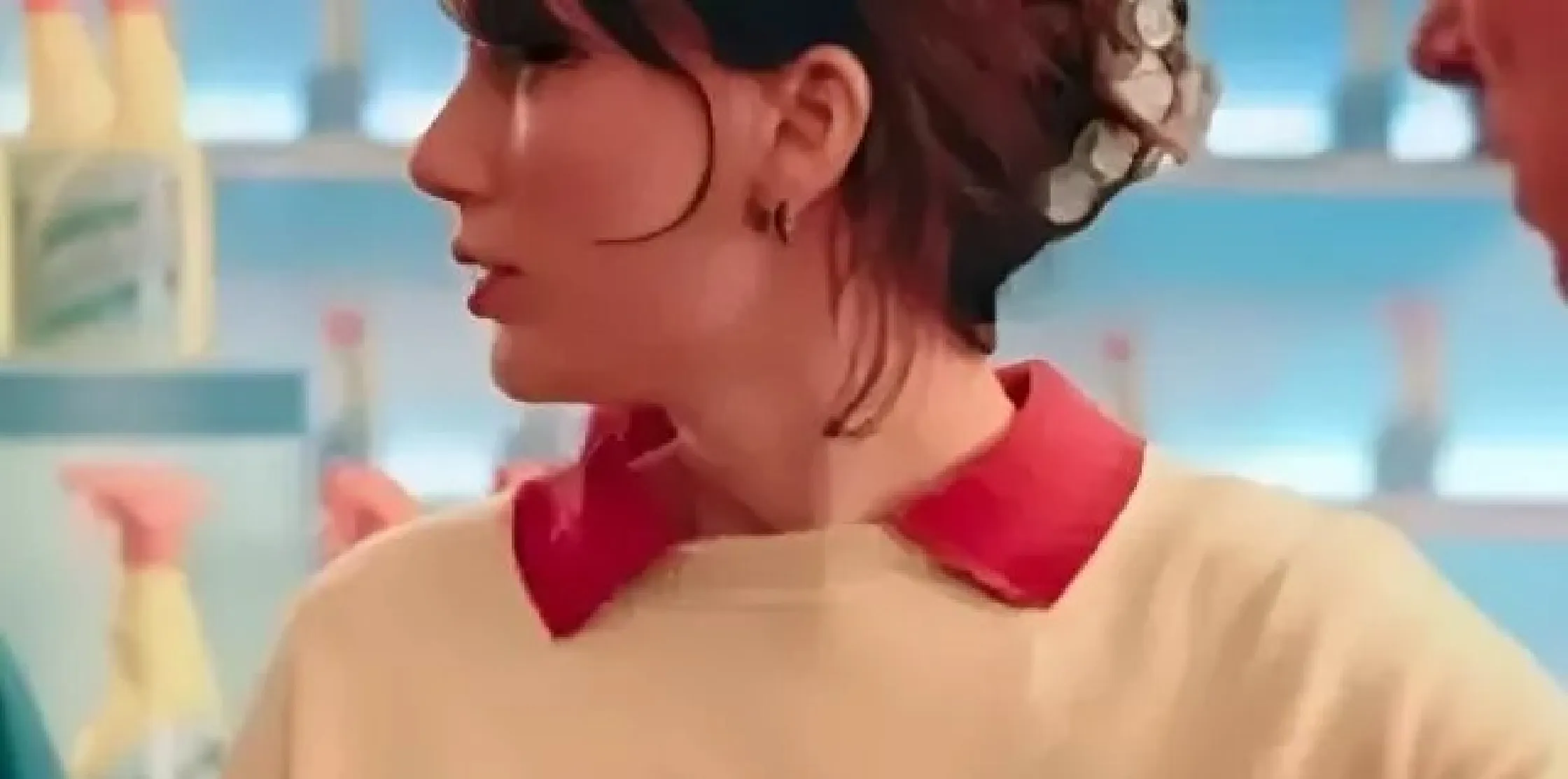 Taylor Swift Opalite music video crewneck sweatshirt in soft beige with a whimsical kitten graphic on the front, featuring a bright red collar, styled on a mannequin against a neutral background.