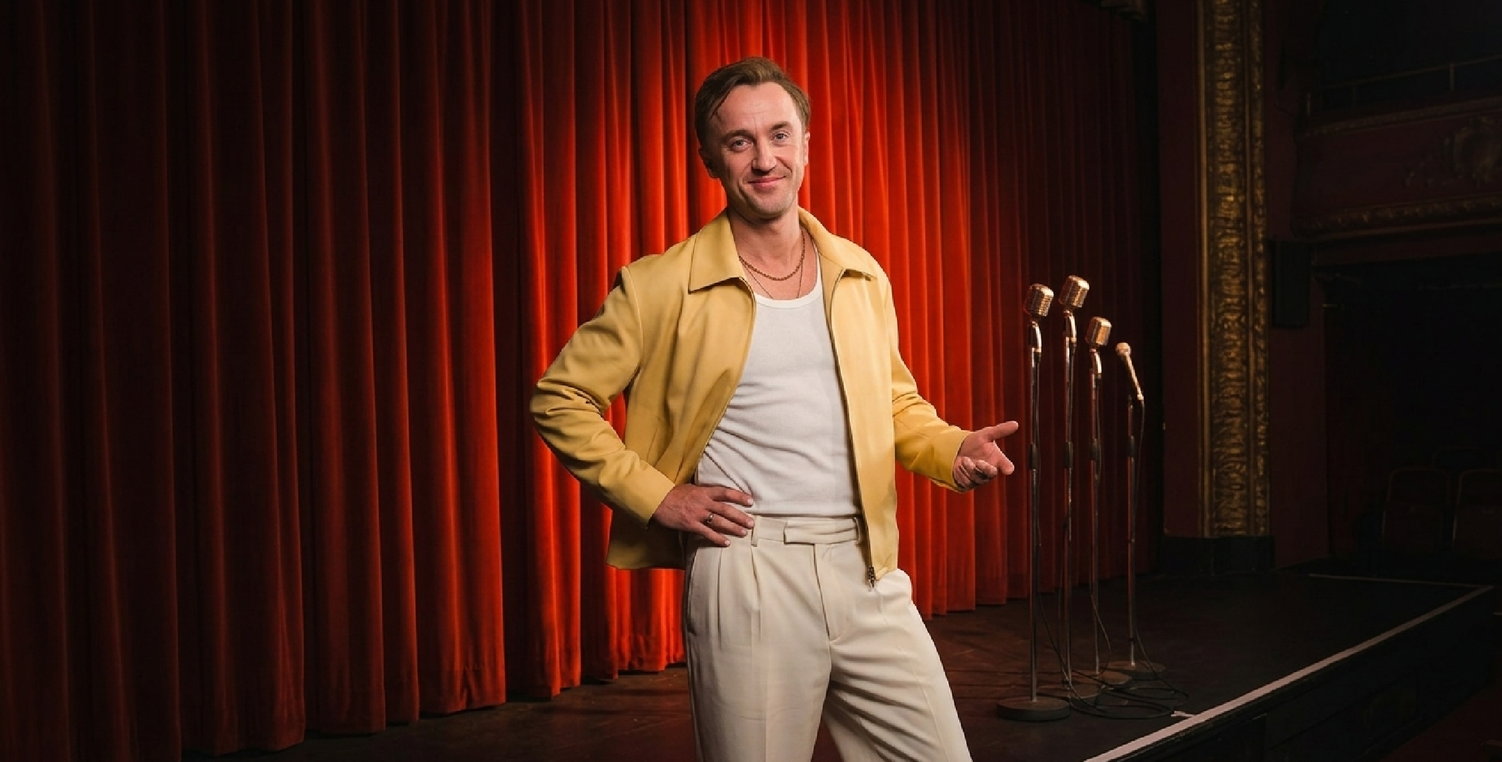 Tom Felton They Will Kill You Premiere 2026 yellow zipper jacket with minimalist design and sleek spread collar inspired by Tom Felton’s SXSW style