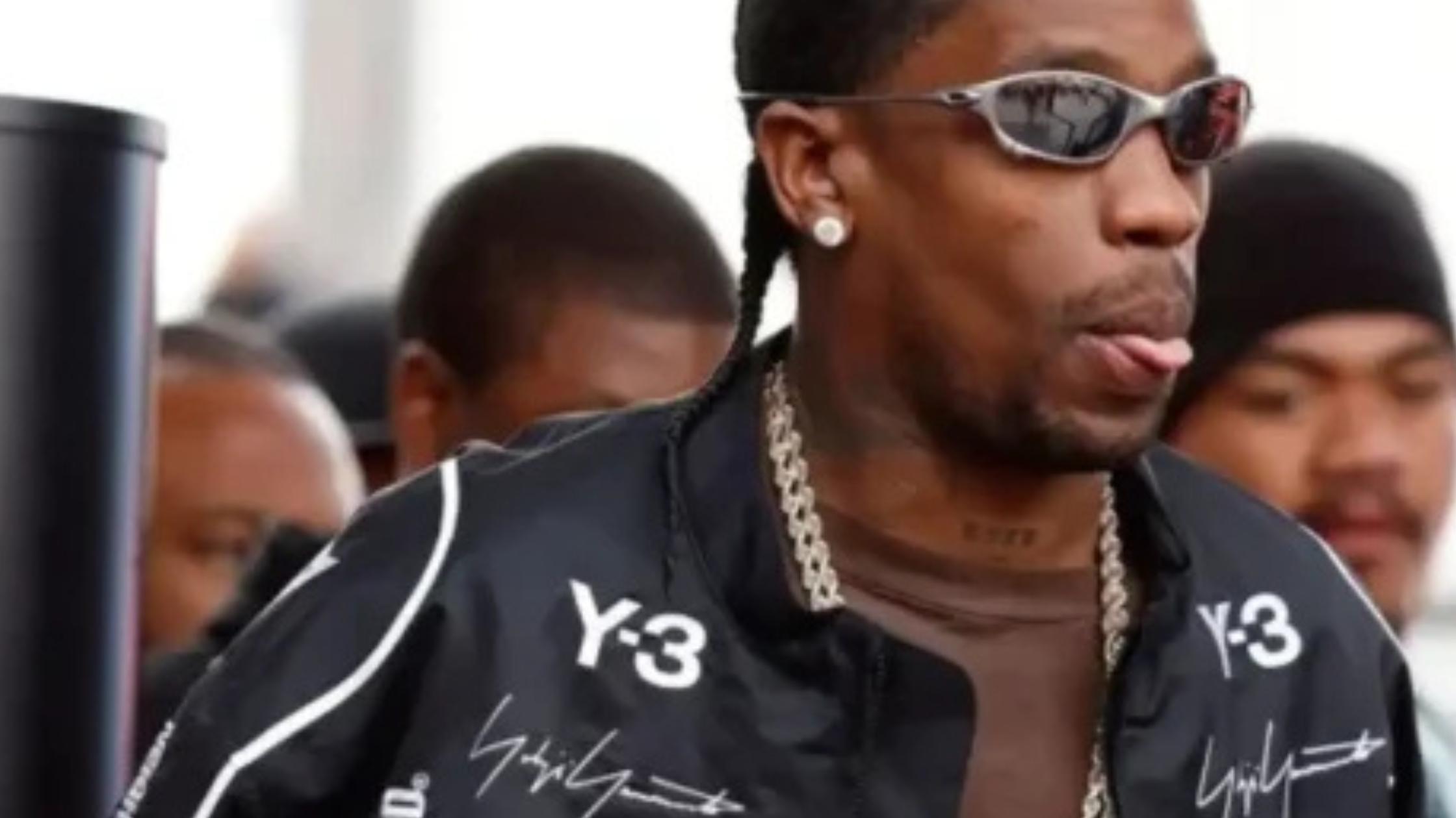 Formula 1 Las Vegas Grand Prix star Travis Scott wears a stylish racing-inspired bomber jacket, adding bold motorsport energy to the event.