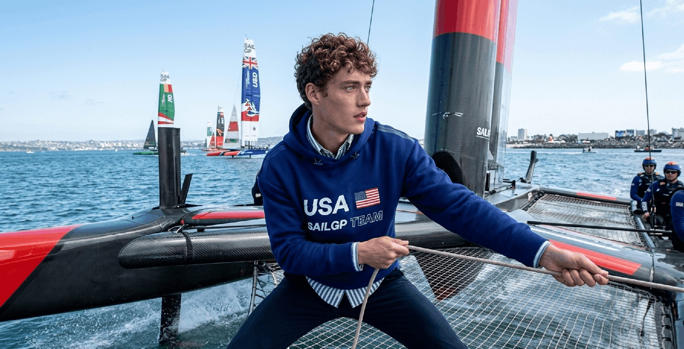 USA SailGP Team Hoodie in navy blue and red with American flag and bold USA lettering