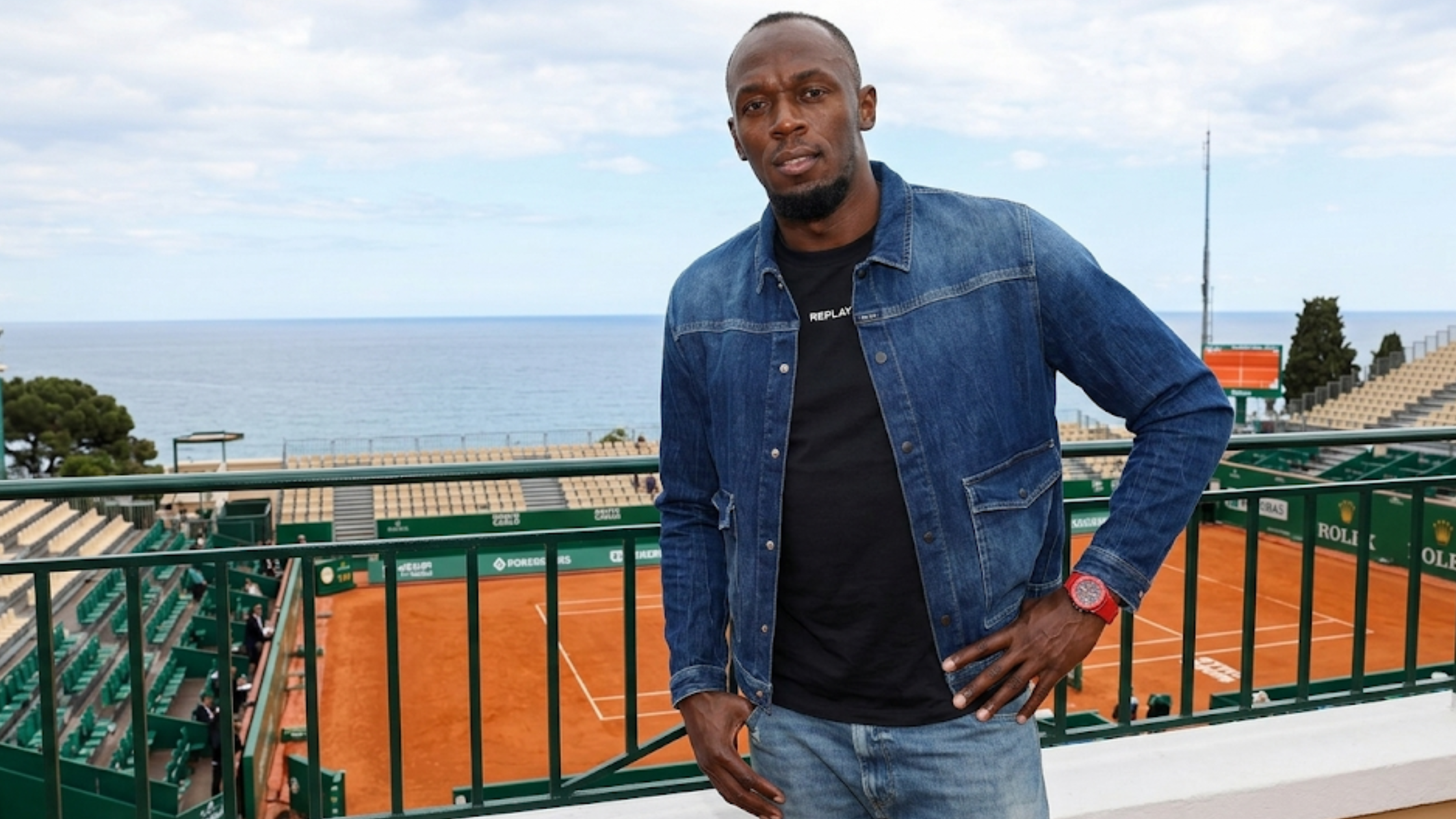 Usain Bolt Rolex Monte-Carlo Masters 2026 indigo blue distressed denim trucker jacket with oversized patch pockets